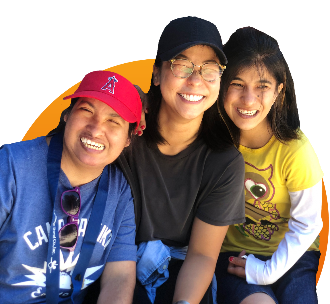 Three smiling participants together, framed by a circular brand graphic